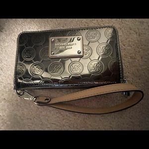 Michael Kors Silver metallic accordion wallet. NWOT